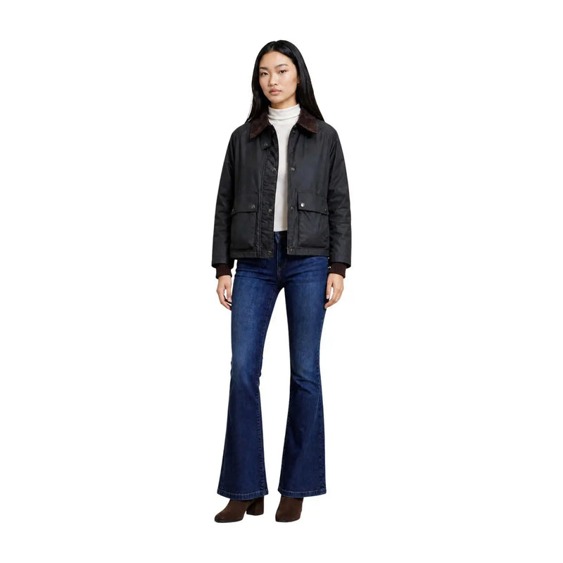 Black leather jacket with brown shearling collar and flap pockets paired with choral women green cotton blazer classic zip pocket