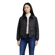 Black waxed cotton field jacket with brown shearling collar and cuffs shown from the front in choral women green cotton blazer style