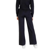 Black wide-leg choral women trousers in viscose blend paired with ribbed knit top featuring sleek silhouette for fall winter