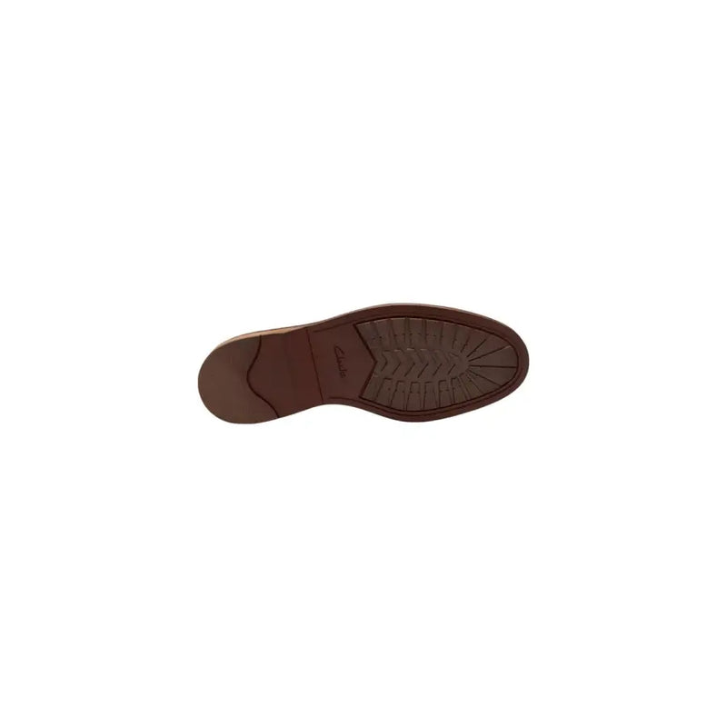 Brown rubber sole with textured tread and clarks logo embossed near the heel of clarks men lace up camel suede shoes