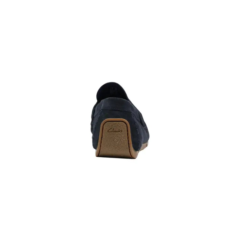 Navy blue suede Clarks men moccasin loafer with a tan rubber sole for spring summer wear