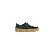 Clarks men slip on shoe green fabric with dark green suede upper tan rubber sole and distinctive lacing system