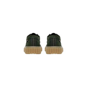 Clarks men slip on shoes in dark green canvas with tan rubber sole and white stitching detail lightweight design