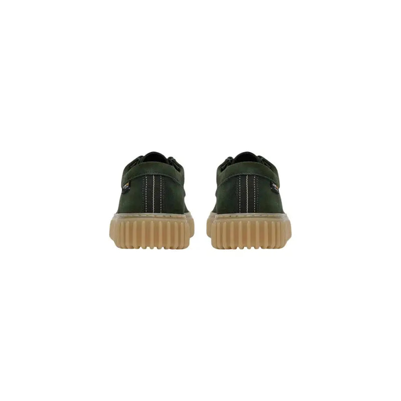 Clarks men slip on shoes in dark green canvas with tan rubber sole and white stitching detail lightweight design