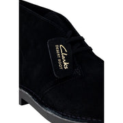 Clarks mens black suede desert boot with gold lettering on black leather tag and lace up design