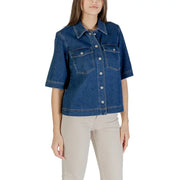 Classic blue short sleeve cotton shirt for women featuring a denim jacket style with silver buttons and front pockets