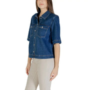 Classic blue short sleeve cotton shirt for women with collar and button-front design in classic denim style