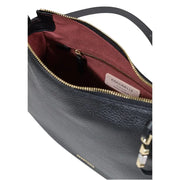 Coccinelle black leather handbag with gold-tone zipper and burgundy interior lining shown from the back side