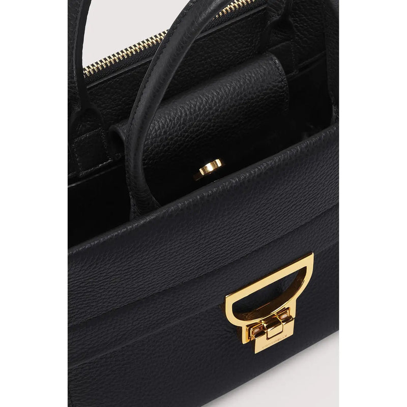 Coccinelle women black leather handbag with gold-tone hardware and distinctive d-shaped clasp arlettis 24cm