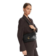 Coccinelle women black leather crossbody bag with gold-tone logo clasp and 26 cm shoulder strap length