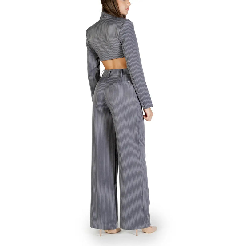 A stylish gray pinstripe two-piece suit with cropped long-sleeve top and wide-leg trousers in polyester by Colcci