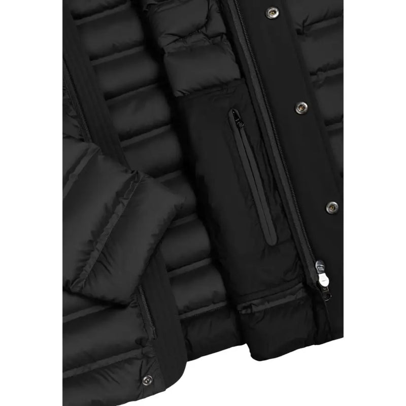 Black puffer jacket with quilted design and zipper details.