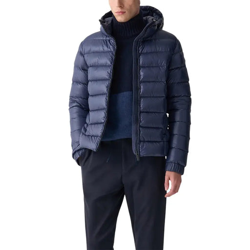 Navy blue down jacket with hood and quilted design, likely from a luxury brand like moncler or loro piana.