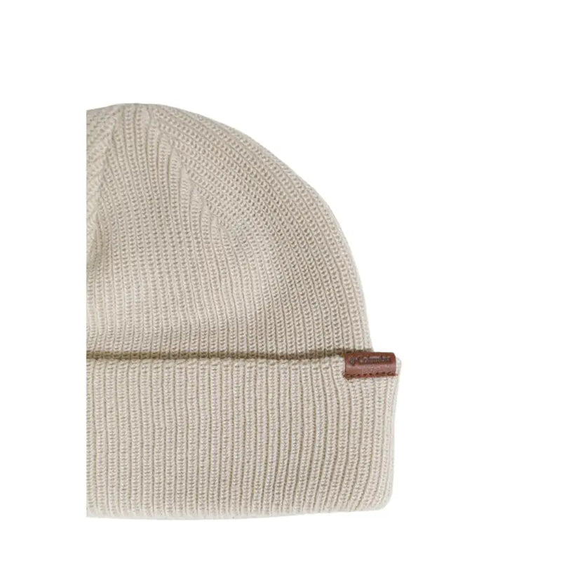 Beige ribbed knit beanie with brown leather patch and logo.