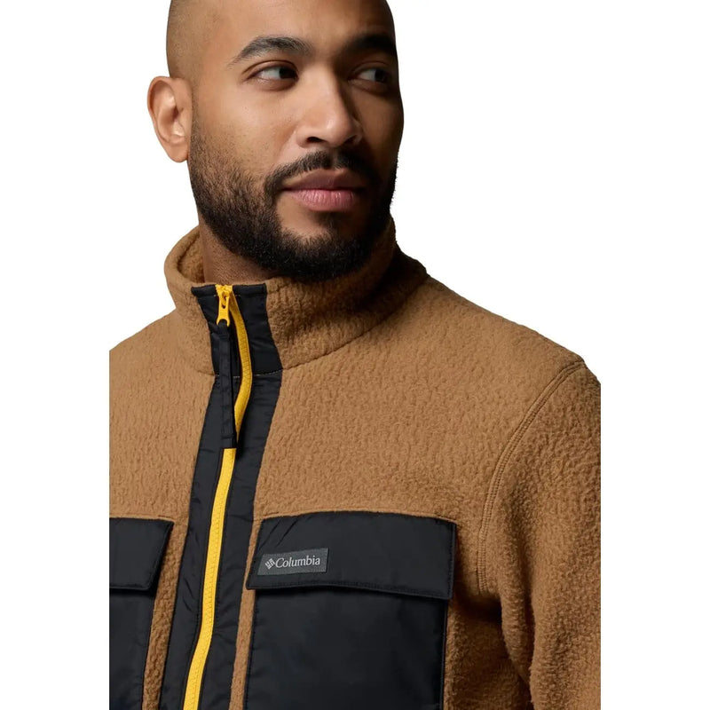 Columbia Sweat à capuche zippé marron en polaire pour homme, empiècements noirs, fermeture éclair jaune vif et logo sur la poche poitrine.