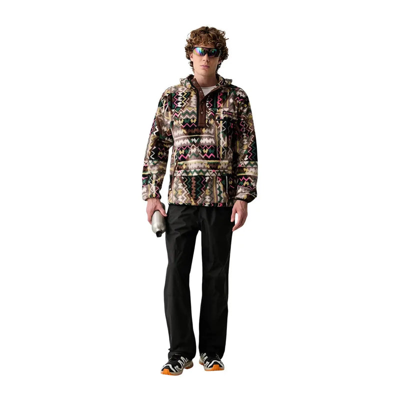 A man wearing a Columbia men brown fleece hoodie with geometric polyester patterns in earthy tones with pink and green accents
