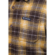 Columbia mens brown polyester shirt jacket featuring yellow and brown plaid flannel with black brand patch on chest pocket