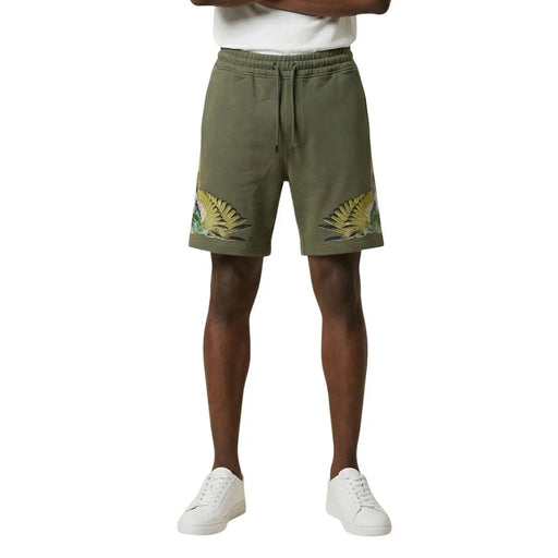 County of milan cotton shorts for men in olive green with embroidered tropical leaf designs, side view