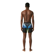 Black swim trunks by County Of Milan with vibrant blue and green wing design on the back for men swimwear