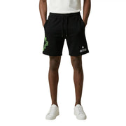 County of Milan shorts for men in black cotton with green pixelated cross and white branding, front view