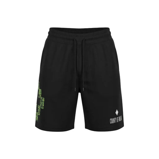 County Of Milan shorts for men in black with green pixelated cross and white logo, front view