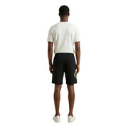 County of Milan shorts for men in black with neon green graphic on side, side view