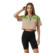 County of Milan women beige cotton cropped t-shirt with vibrant green and white wing design across shoulders