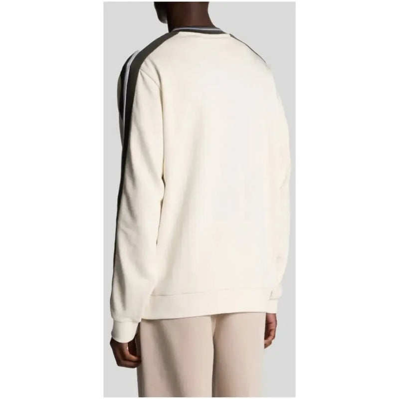 Cream-colored sweatshirt with black and white striped shoulder panels from cream and beige sweatshirts with contrasting details