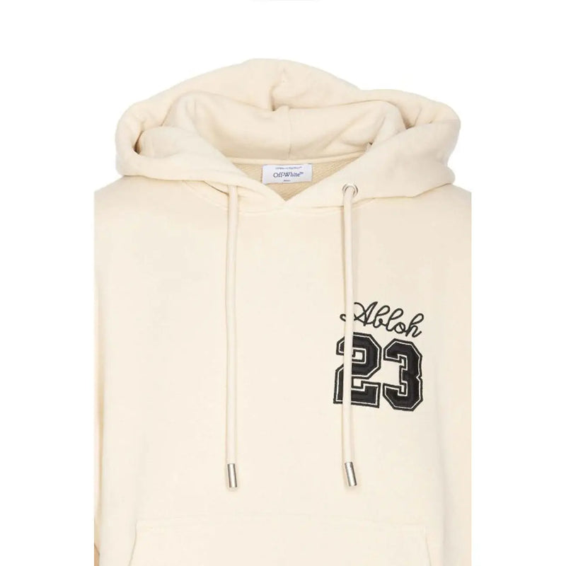 Cream off-white hoodie with abloh 23 black graphic on chest and matching drawstrings with metallic tips