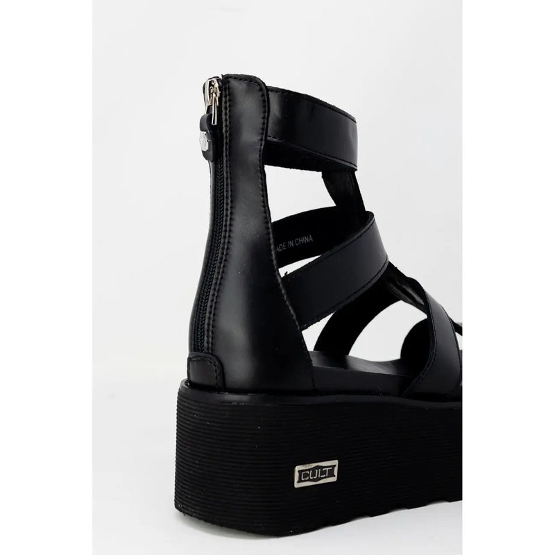 Back view of Cult Women black leather platform slip on sandal with glossy finish multiple crisscross straps and zipper closure