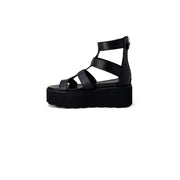Black leather platform sandal with multiple crisscross straps and zipper closure from Cult Women collection