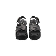 Cult women black leather sandals with crisscross straps silver metal buckles and a platform open toe design