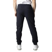 Dark blue men’s trousers displayed alongside black athletic sweatpants in a product image