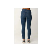 Dark wash blue denim high waisted skinny jeans with dark blue material and subtle thigh fading
