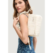 Off-white quilted backpack with braided rope strap and brand name embroidered on the side for women by Desigual
