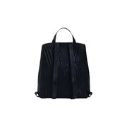 Desigual black polyurethane backpack with wood-grain texture, smooth leather straps, zip closure, and inside pocket