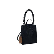 Desigual black polyurethane handbag with textured finish twisted rope handle and brown leather tag featuring zip and inside pocket