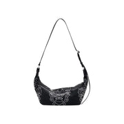 Black polyurethane shoulder bag with stud embellishments, zip closure, and inner pocket