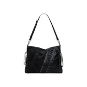 Black leather shoulder bag with diagonal and side lacing details from Desigual