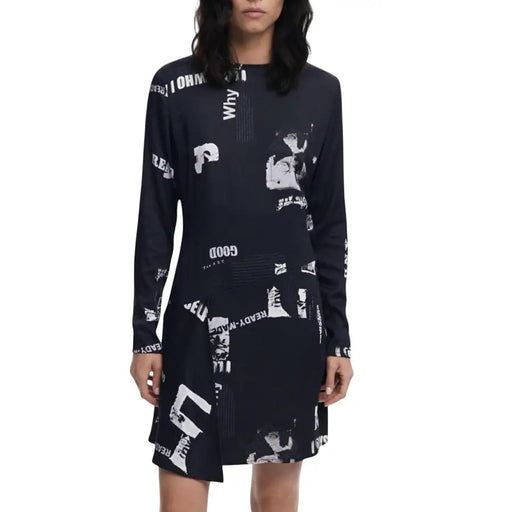 Black long-sleeved mini dress with white graphic print from Desigual featuring a round neck