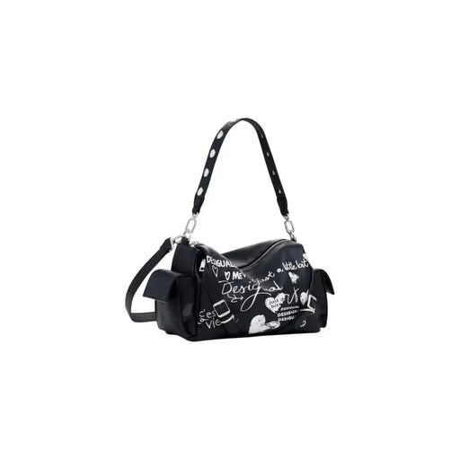 Black shoulder bag with white graffiti-style text and illustrations for Desigual handbag