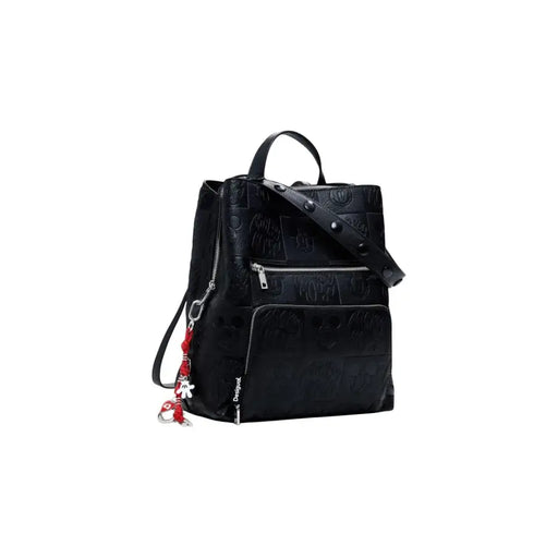 Black embossed faux leather backpack with detachable strap and decorative charms for Desigual handbag
