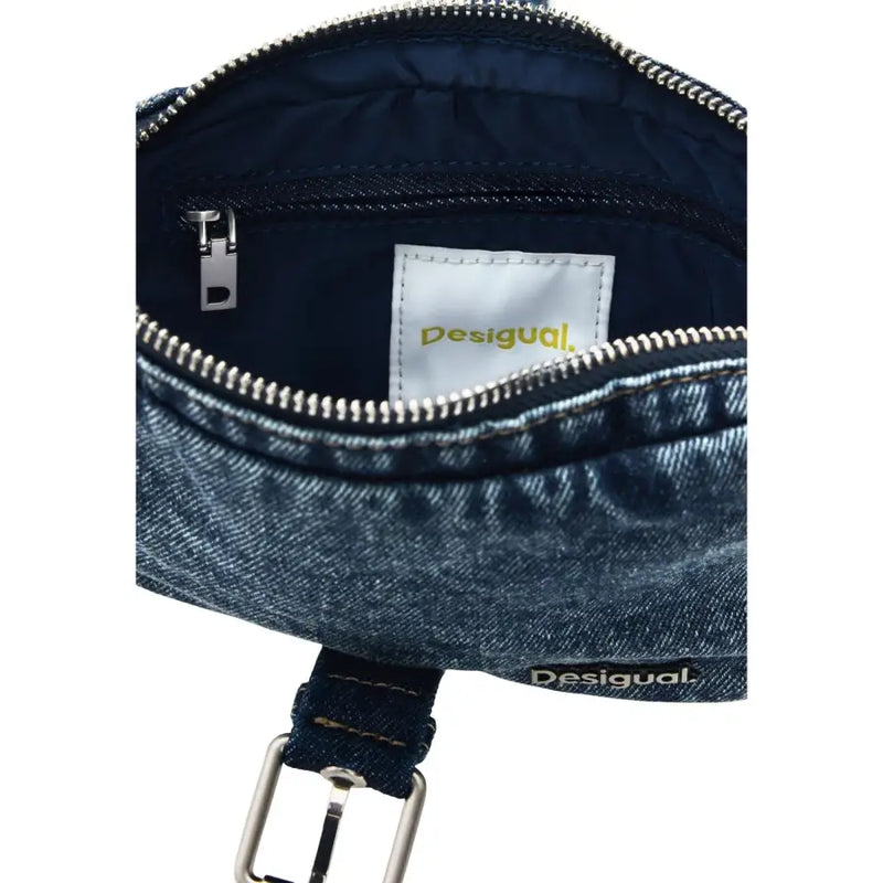 Denim blue Desigual crossbody handbag with silver zipper and buckle featuring shoulder strap and zip pocket