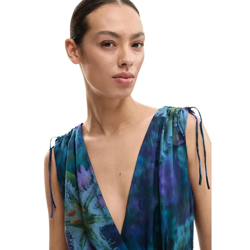 Combinaison Desigual bleue sans manches à col en V pour femme, ornée d'un imprimé floral éclatant