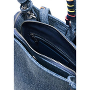 Denim blue Desigual zipper bag with pockets featuring a zipper-lined interior and colorful striped strap accents