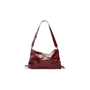 Desigual bordeaux glossy burgundy leather shoulder bag with single strap drawstring ties and zip pocket