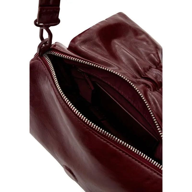 Desigual bordeaux women bag in rich burgundy leather with silver zipper and adjustable crossbody strap featuring inside pocket