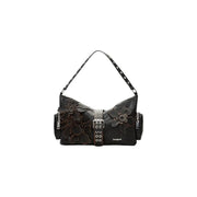 Black leather shoulder bag with embossed floral appliqués and studded belt detail from Desigual brown polyester collection