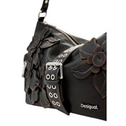 Black leather shoulder bag with dimensional floral appliqués and silver buckle strap by desigual polyester handbag