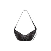 Black shoulder bag with silver stud embellishments featuring a floral or paisley pattern